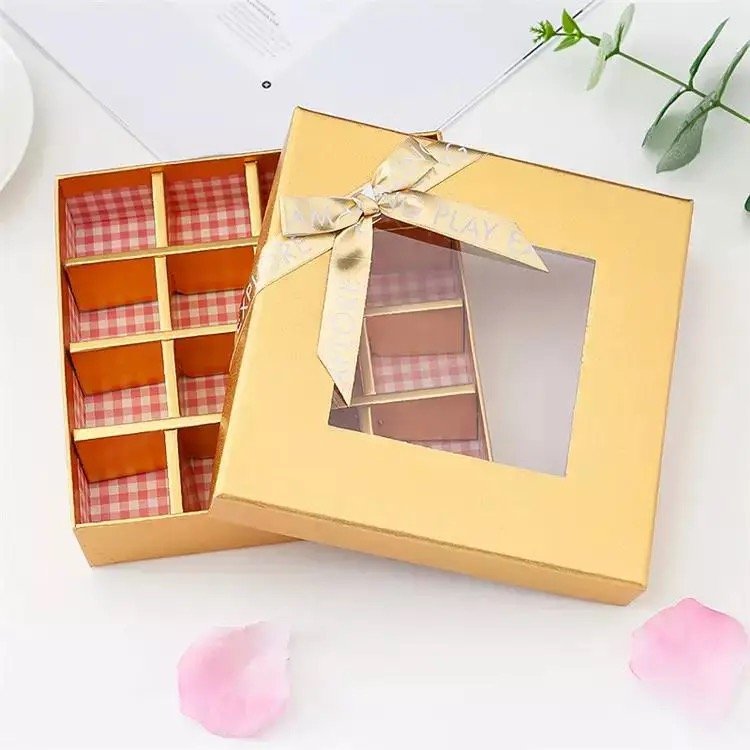 gold-chocolate-box-with-ribbon علبة تغليف كرتونية للشوكلا مع شبرة - ذهبي - قطعة - الصورة 1